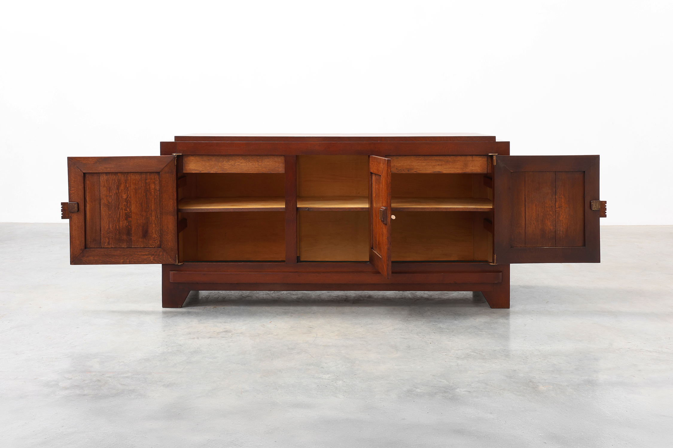Art Deco carved geometric sideboard by Charles Dudouyt in oak, France ca. 1940thumbnail